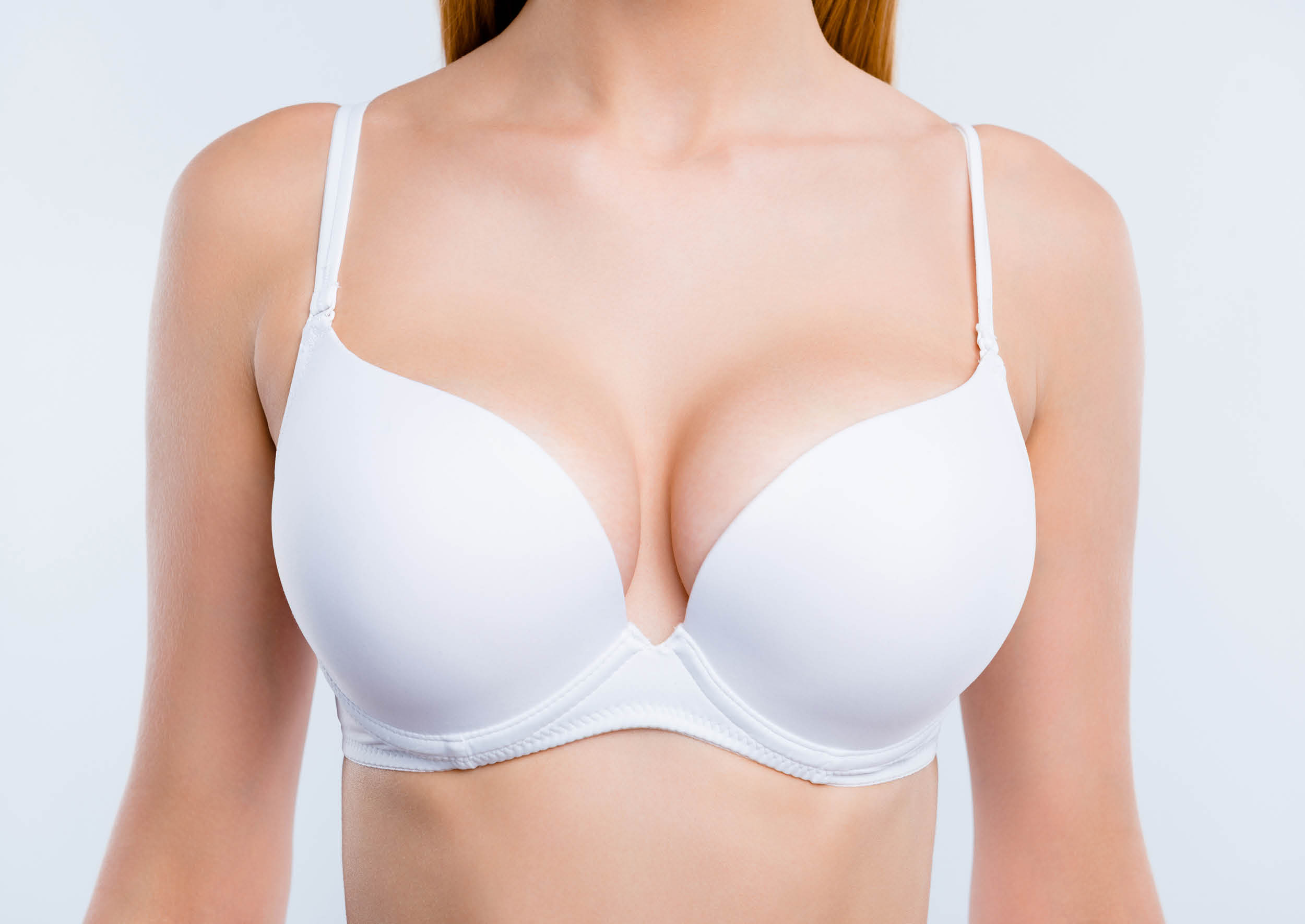 Breast augmentation is a surgical procedure to increase the size and enhance the shape of a person's breasts using implants or fat transfer.